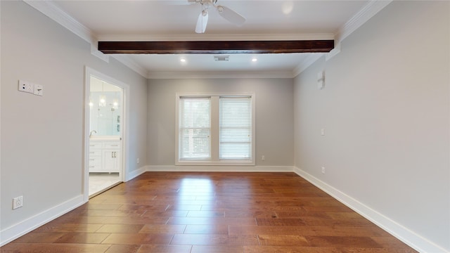 spare room with dark hardwood / wood-style floors, ceiling fan, and crown molding