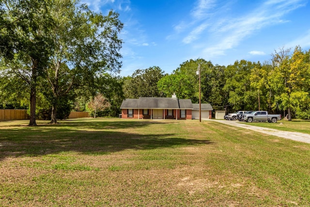 ranch-style house with a front yard