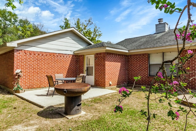 rear view of house with a patio area