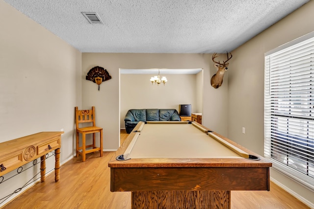 rec room featuring a healthy amount of sunlight, light wood-type flooring, and pool table