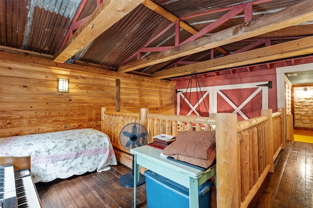 bedroom featuring wood ceiling, vaulted ceiling with beams, and dark hardwood / wood-style flooring