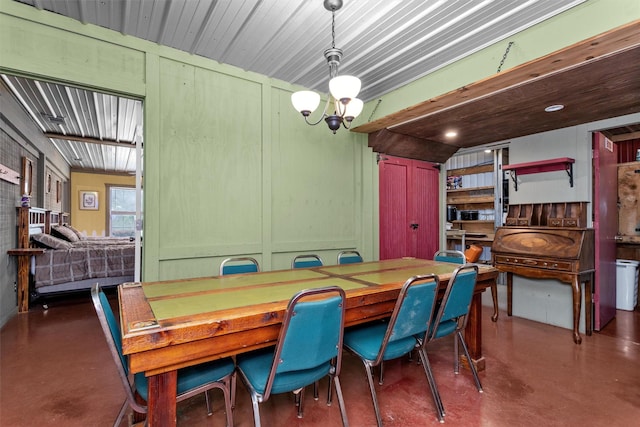 dining area with a notable chandelier