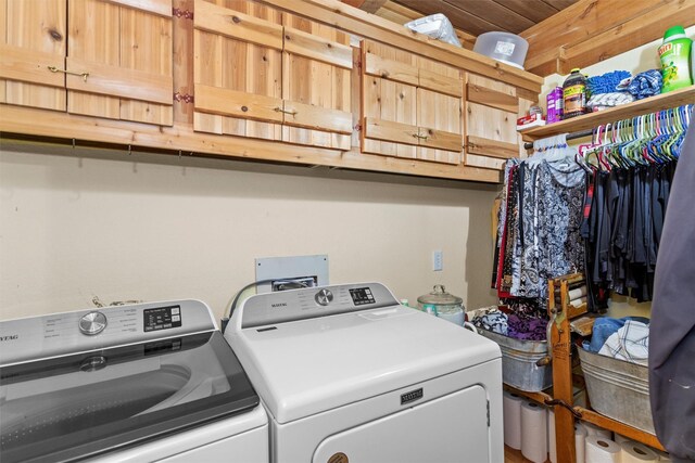 washroom with hookup for a washing machine and washer and clothes dryer