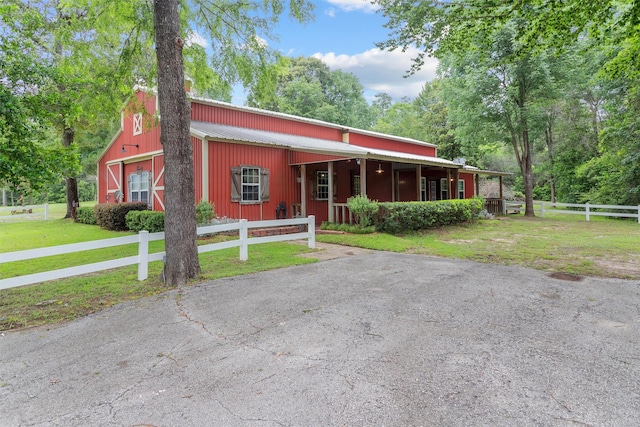 view of front of home with a front yard