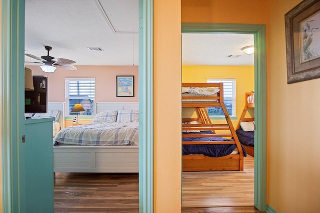 bedroom featuring hardwood / wood-style floors and ceiling fan