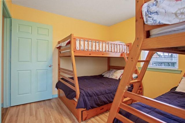 bedroom with light wood-type flooring