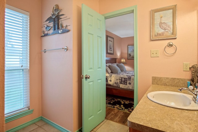 bathroom with vanity and tile patterned floors