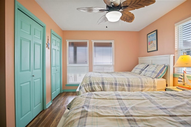 bedroom featuring ceiling fan and dark hardwood / wood-style flooring