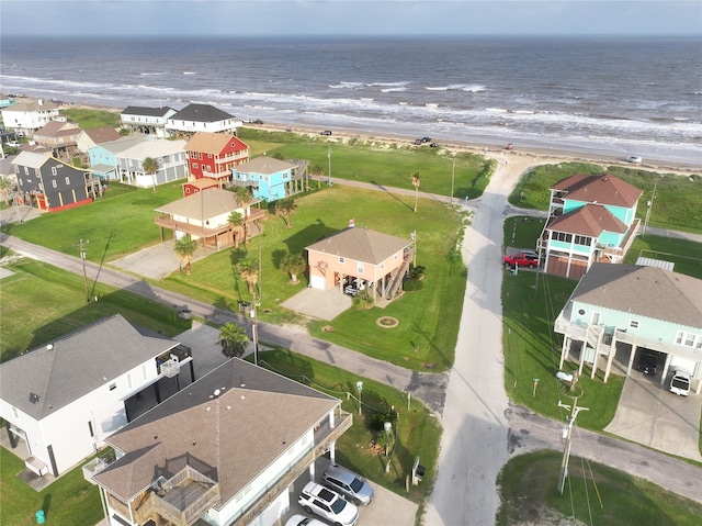 aerial view with a beach view and a water view