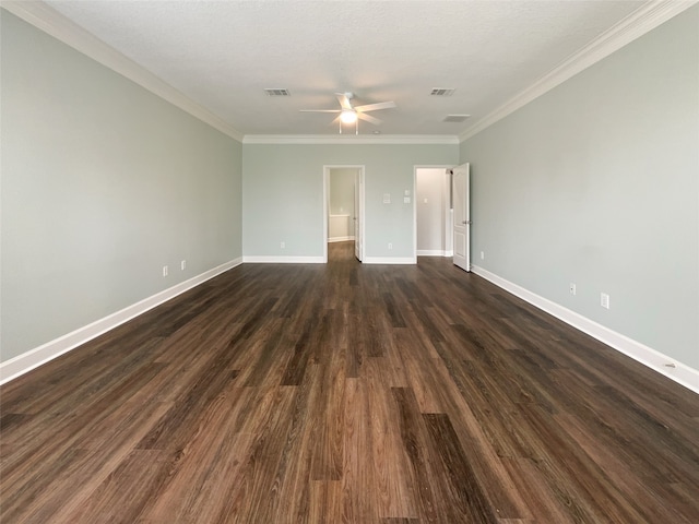 spare room with a textured ceiling, dark wood-type flooring, ceiling fan, and ornamental molding