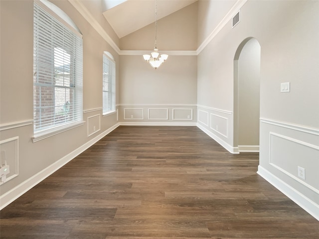 interior space featuring high vaulted ceiling, a chandelier, and dark hardwood / wood-style floors