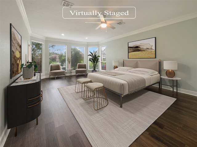 bedroom featuring dark wood-type flooring, ceiling fan, and crown molding