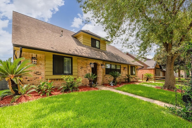 view of front of house with a front lawn