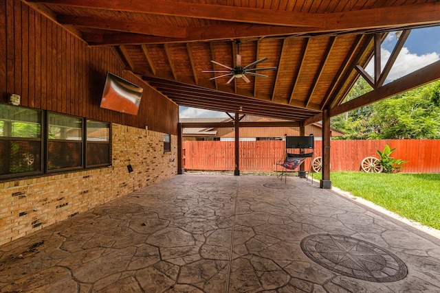 view of patio featuring ceiling fan