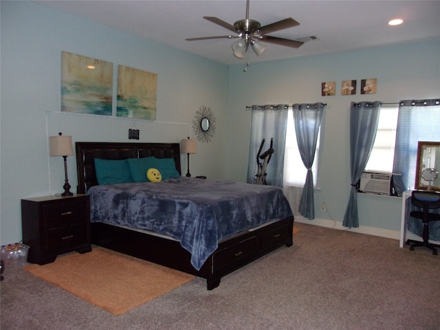 carpeted bedroom with ceiling fan