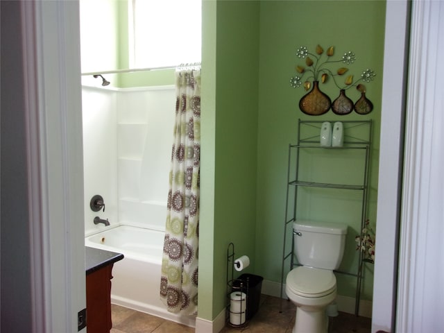 full bathroom with shower / bath combination with curtain, vanity, toilet, and tile floors