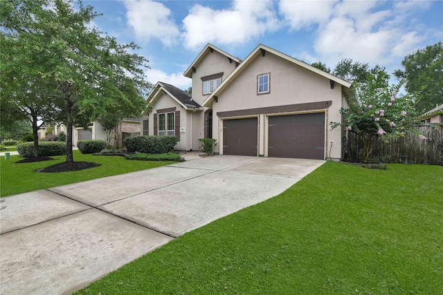 front of property featuring a front lawn and a garage