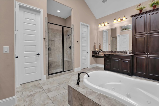 bathroom featuring vanity, lofted ceiling, and plus walk in shower