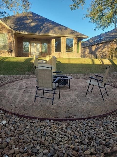 view of patio / terrace featuring a fire pit