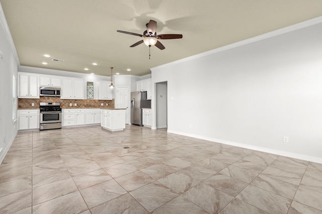 kitchen with white cabinetry, ceiling fan, backsplash, appliances with stainless steel finishes, and ornamental molding