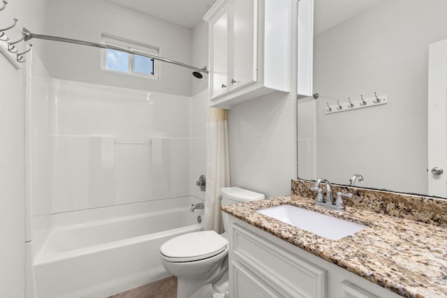 full bathroom featuring vanity,  shower combination, and toilet