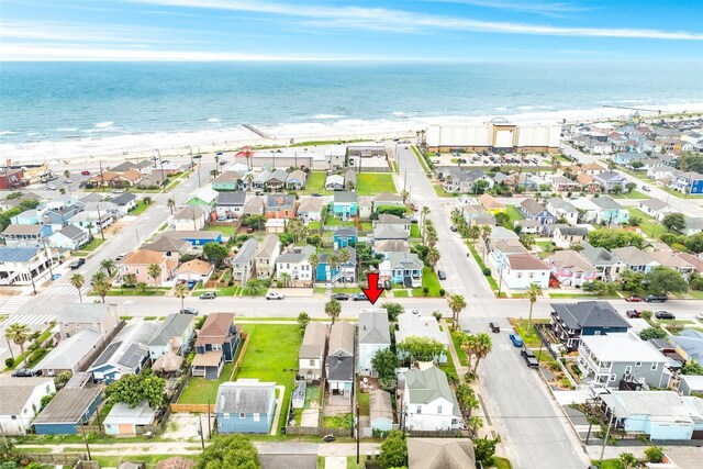 aerial view featuring a beach view and a water view