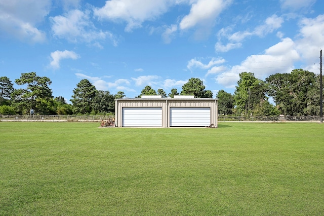 exterior space with a garage and an outdoor structure