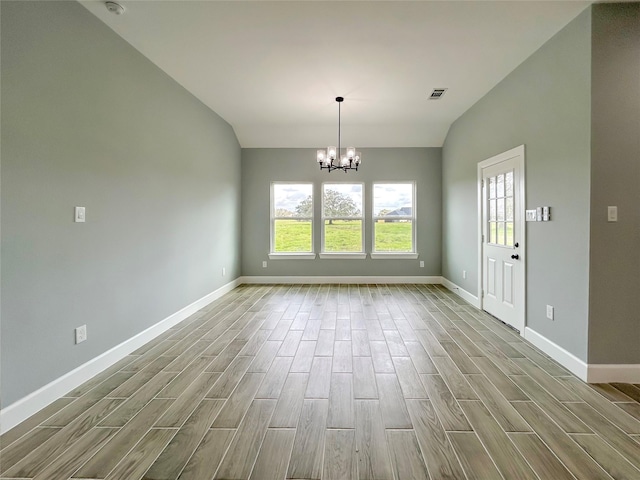 unfurnished dining area with a chandelier, plenty of natural light, lofted ceiling, and wood tiled floor