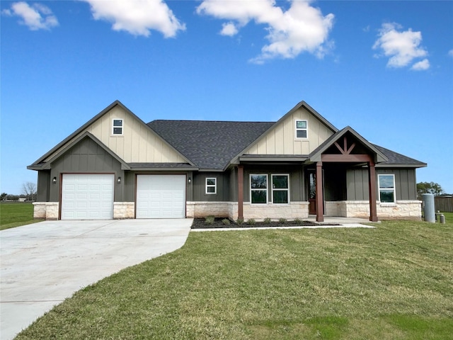 craftsman inspired home with an attached garage, stone siding, driveway, a front lawn, and board and batten siding