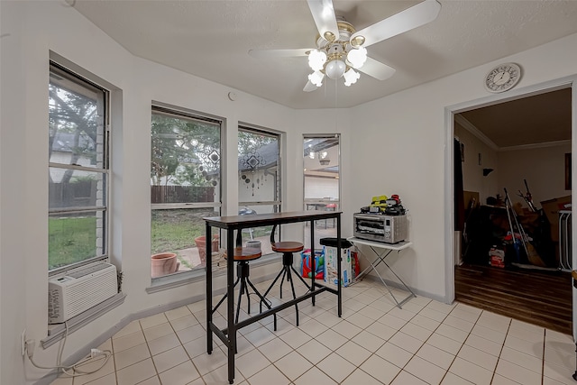 tiled dining space featuring ornamental molding, a healthy amount of sunlight, ceiling fan, and cooling unit