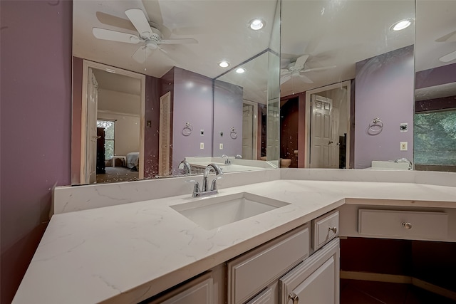 bathroom featuring vanity and ceiling fan