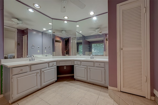 bathroom with tile patterned floors and vanity