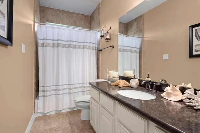 full bathroom with tile flooring, toilet, shower / tub combo with curtain, and oversized vanity