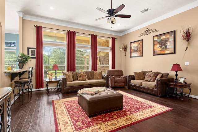 living room featuring ceiling fan, dark hardwood / wood-style flooring, and crown molding