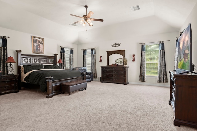 bedroom featuring ceiling fan, carpet floors, and lofted ceiling