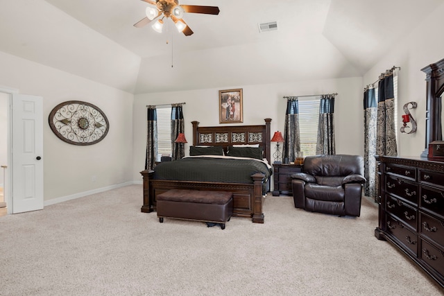 bedroom with light carpet, lofted ceiling, and ceiling fan