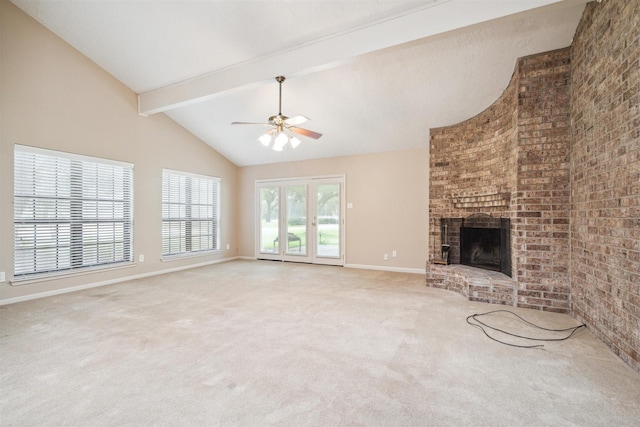 510 Brazos Hill Ln, Sealy, TX 77474 - unfurnished living room with a ceiling fan, carpet floors, beamed ceiling, a fireplace, and high vaulted ceiling