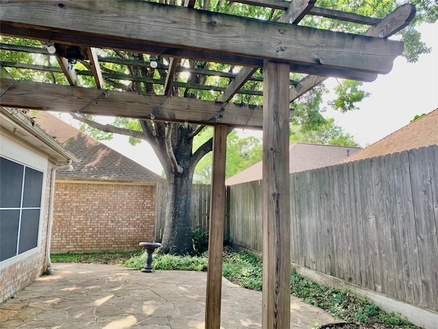 view of patio featuring a pergola