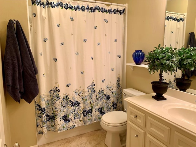 bathroom with tile patterned flooring, vanity, a shower with shower curtain, and toilet