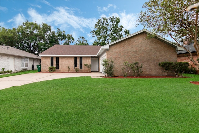 ranch-style home with a front lawn