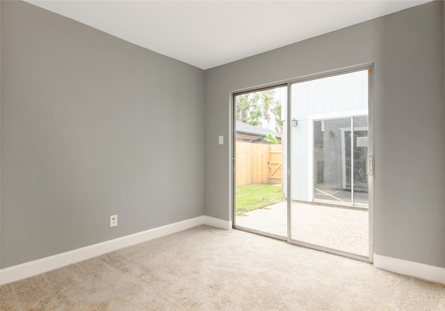 view of carpeted spare room