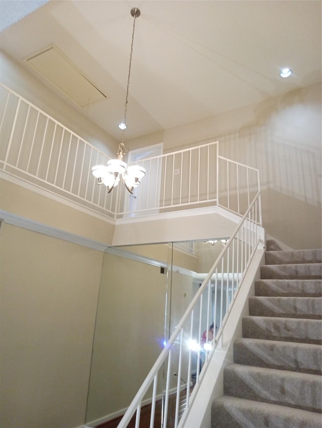 stairway with a towering ceiling