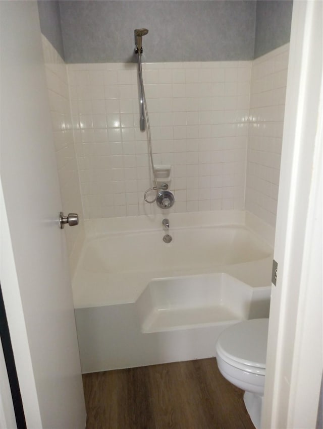 bathroom with toilet and hardwood / wood-style floors