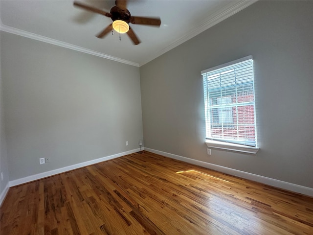 spare room with crown molding, ceiling fan, and light hardwood / wood-style floors