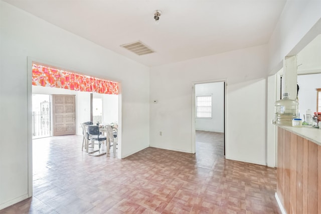 empty room with light parquet floors