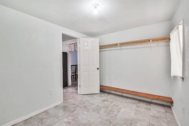 unfurnished bedroom featuring a closet