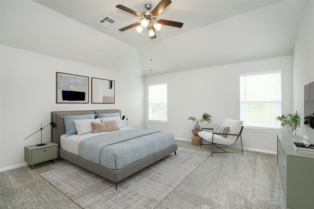 carpeted bedroom with ceiling fan and lofted ceiling