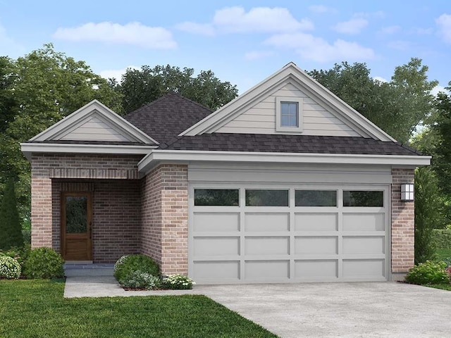 view of front facade with a garage and a front yard