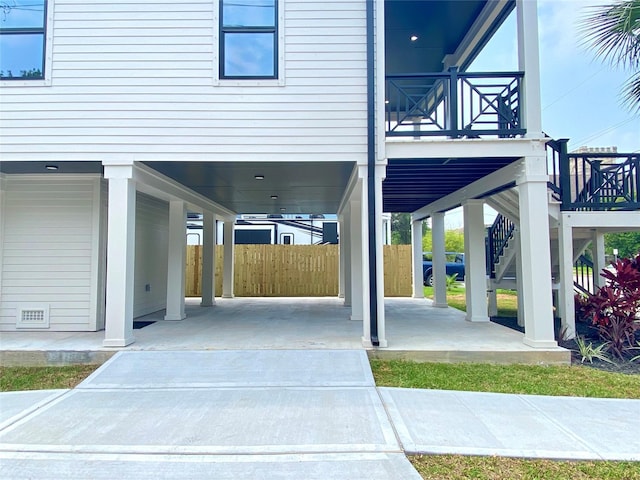 view of patio / terrace with a carport