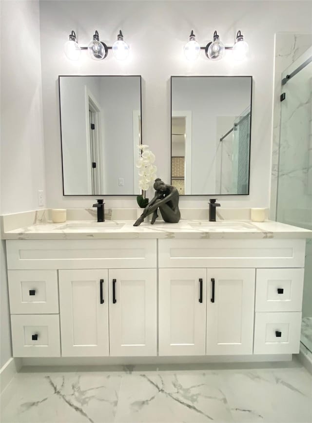 bathroom with vanity and an enclosed shower